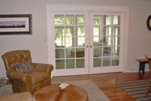 Interior of home with french doors closed still allows tons of natural light - home additions atkinson nh
