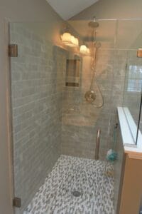 Custom tile shower with glass partition and door - home additions pelham nh
