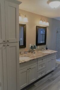 Double vanity with linen tower and grantie - general contractors salem nh
