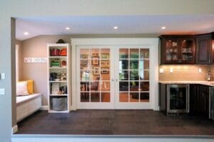 Beautiful french sliding doors can remain open or be closed for entertaining - general contractors pelham nh