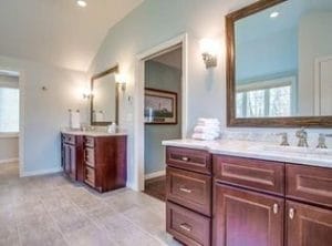 Remodeled bathroom with two separate sinks - home additions atkinson nh
