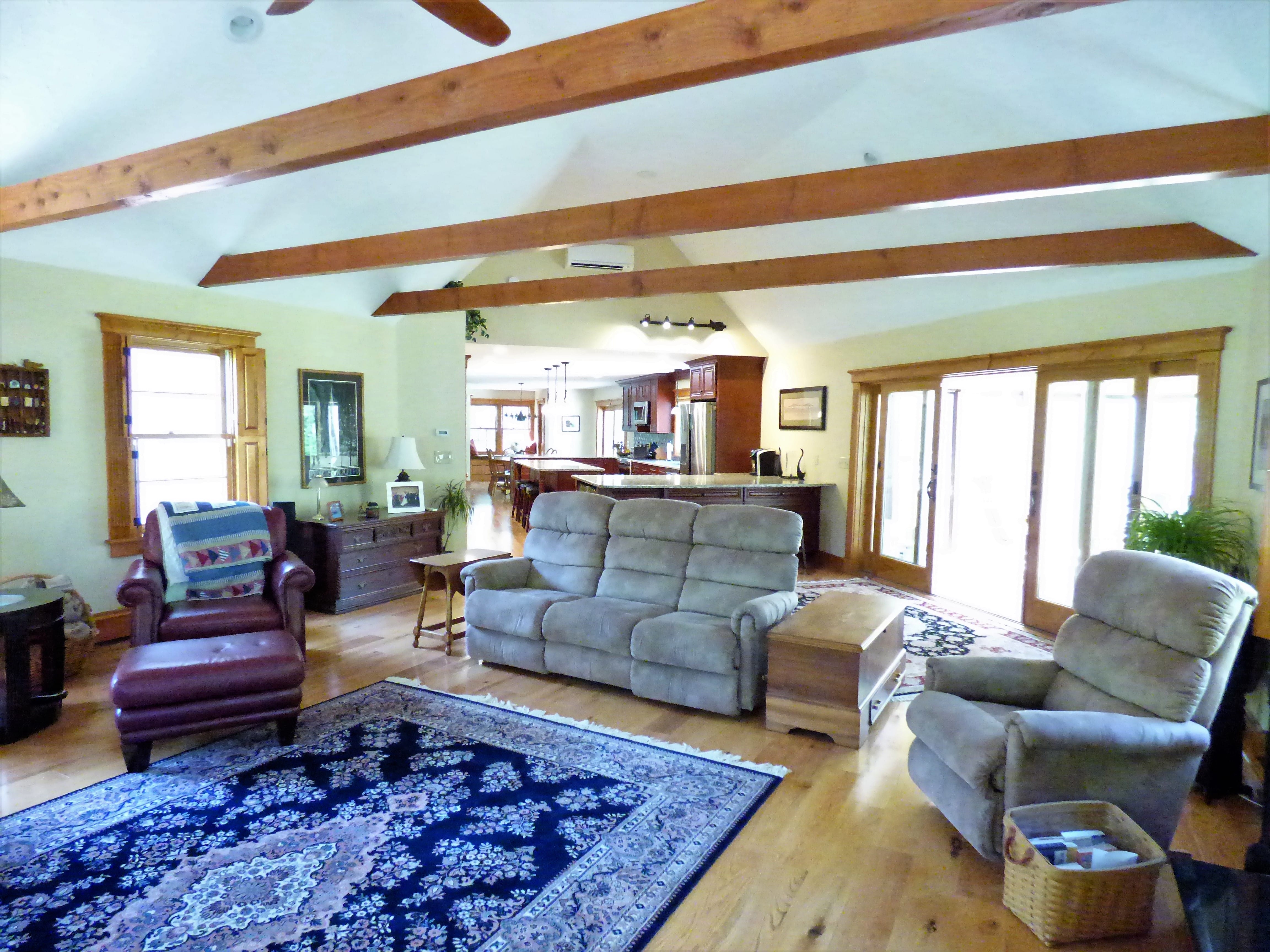 Open space living room after remodeling - in law apartment additions atkinson nh