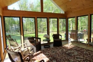 Oil rubbed bronze finish on the storm units make a nice contract against the natural wood - general contractors windham nh