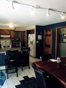 before partial wall was removed in the kitchen