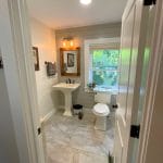 Newly constructed half bath with painted pine walls - in law apartment additions pelham nh