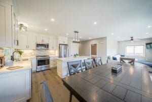 Remodeled kitchen with dining table - home additions atkinson nh