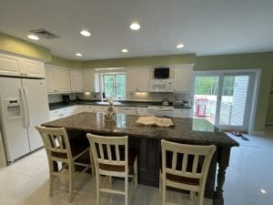 Pre-remodeling open space kitchen with isle - home additions pelham nh