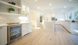 Remodeled open space with kitchen and living area - home additions pelham nh