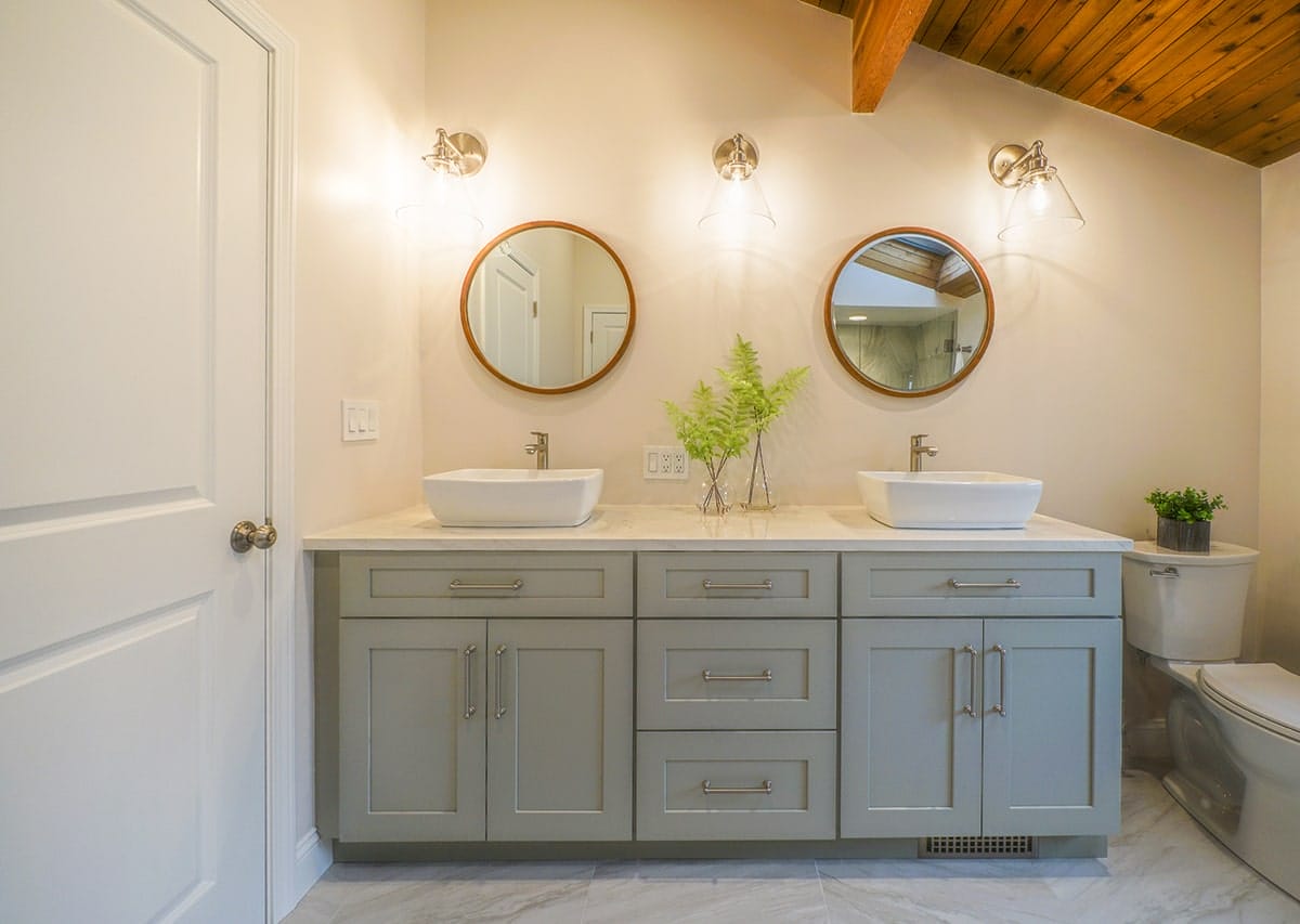 Remodeled bathroom with double sink - general contractors pelham nh