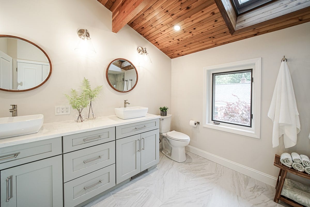 Remodeled bathroom with double sink - general contractors pelham nh