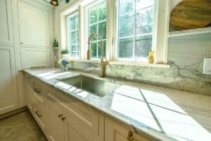 Remodeled kitchen with windows - in law apartment additions auburn nh