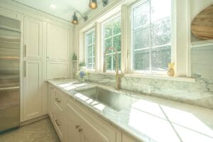 Remodeled kitchen with big windows - kitchen renovations windham nh